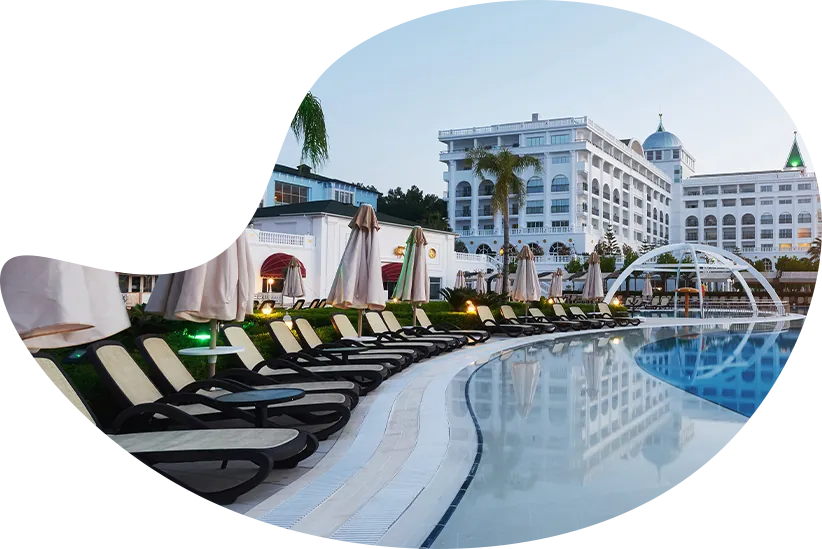 Resort hotel with pool and sun loungers