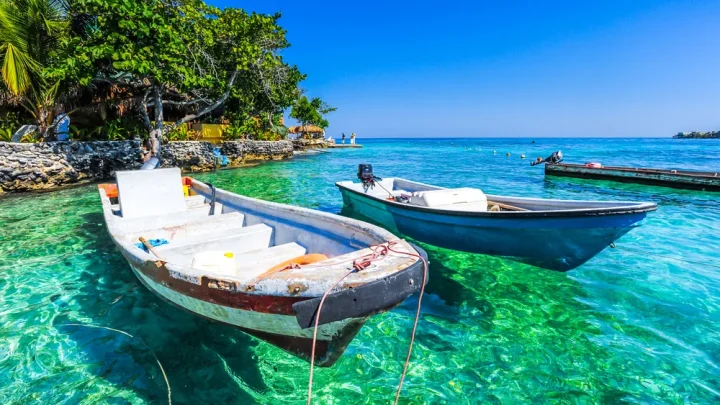 Boats on turquoise water at Islas del Rosario, near Cartagena, Colombia